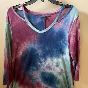 Tie dye half sleeve! Longs sides that flare out slightly! Fun colors and design!